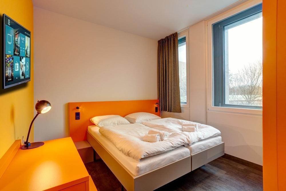 Meininger Hotel Muenchen Olympiapark Munique Exterior foto